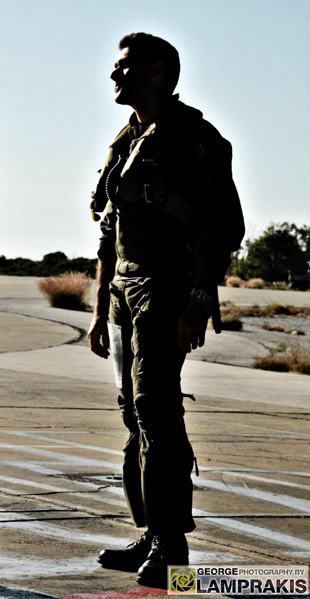 Manolis Karachalios in flight suit on an airfield